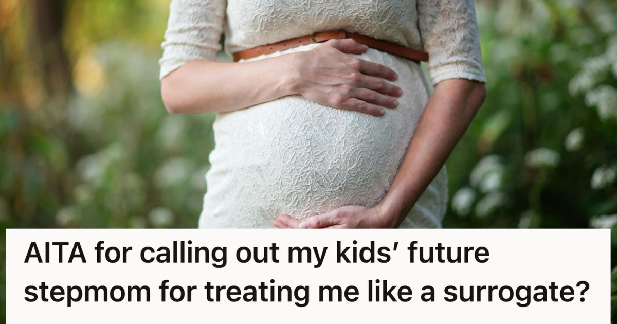 Woman holding her pregnant belly