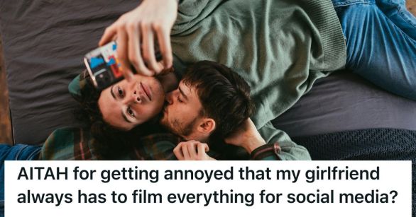 Man cuddling woman while she poses for a selfie