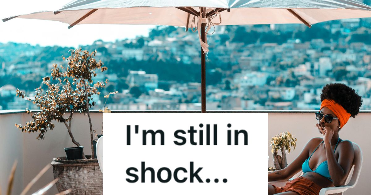 Woman outside under a table shade