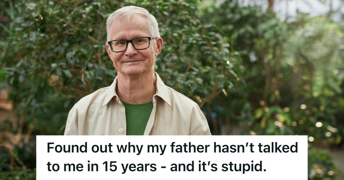 Older man smiling in front of a tree