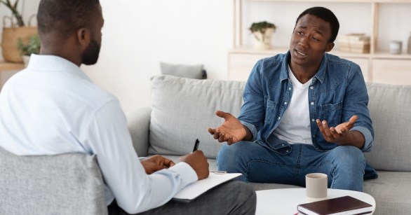 Black man in talk therapy