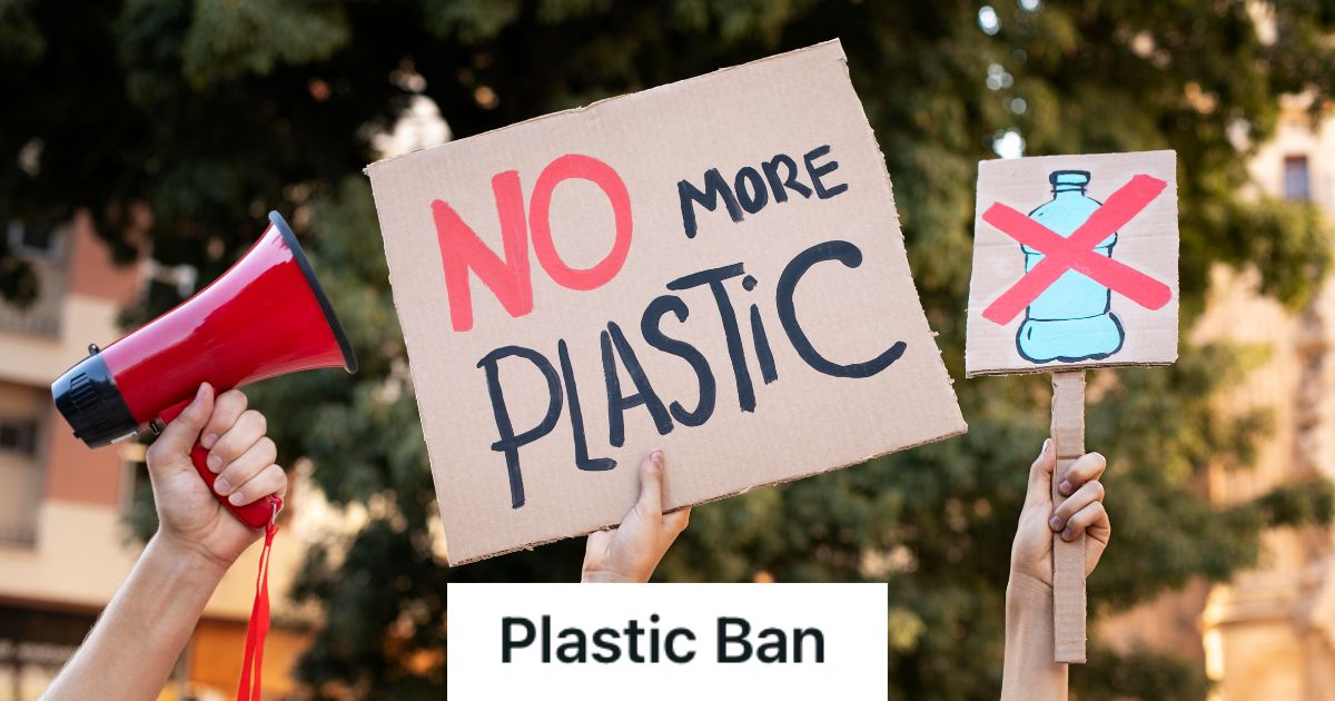 People holding cardboards that say No More Plastic