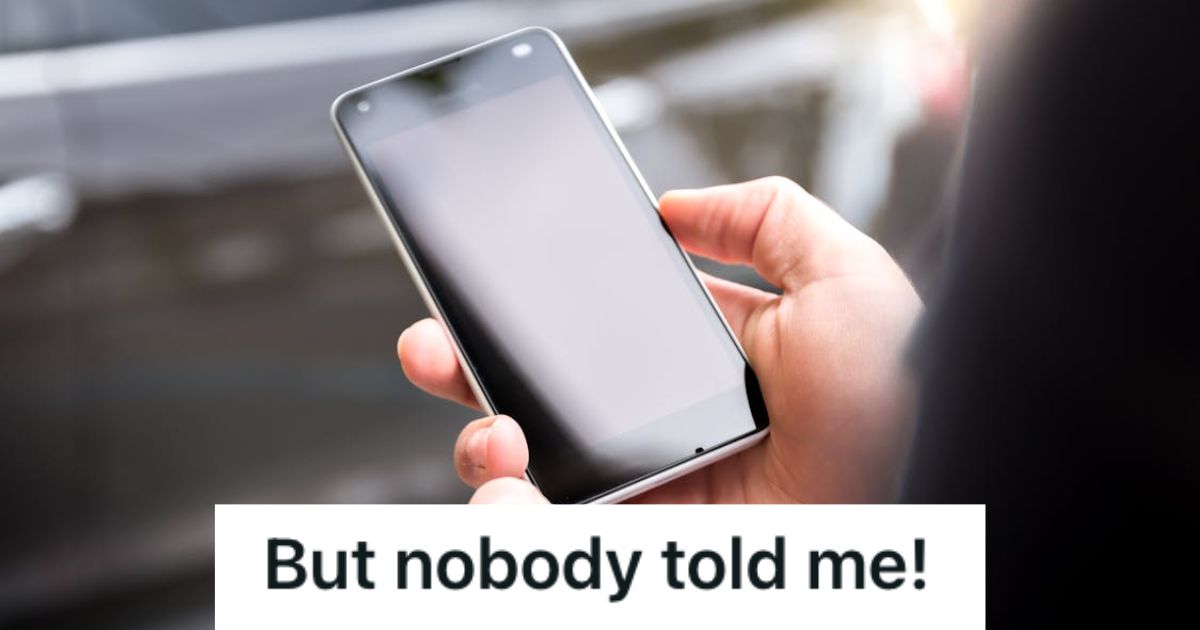 Person holding a broken phone