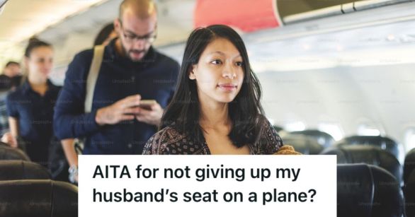 People standing in the airplane aisle