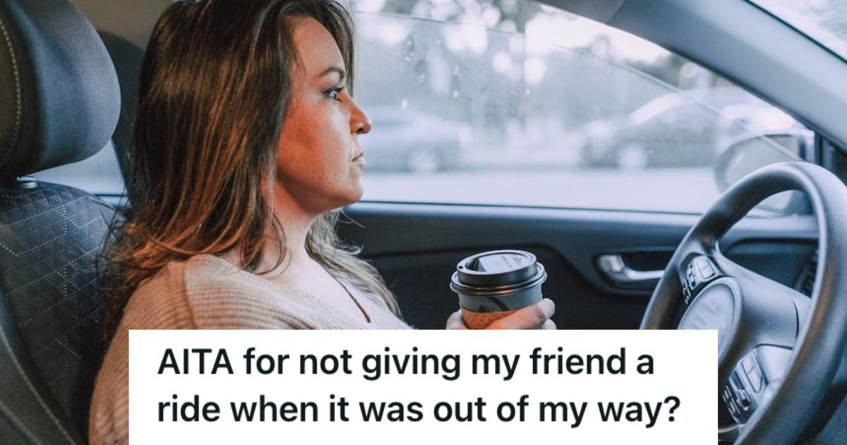 Woman sitting in the driver's seat of the car and holding a cup of coffee