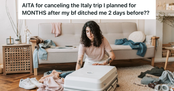 Woman fixing her luggage before a trip