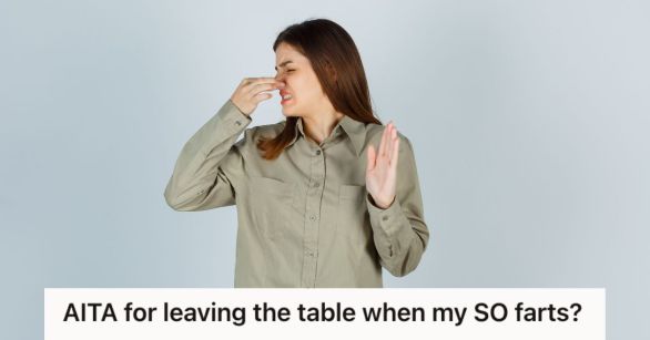 Woman covering her nose because of something smelly