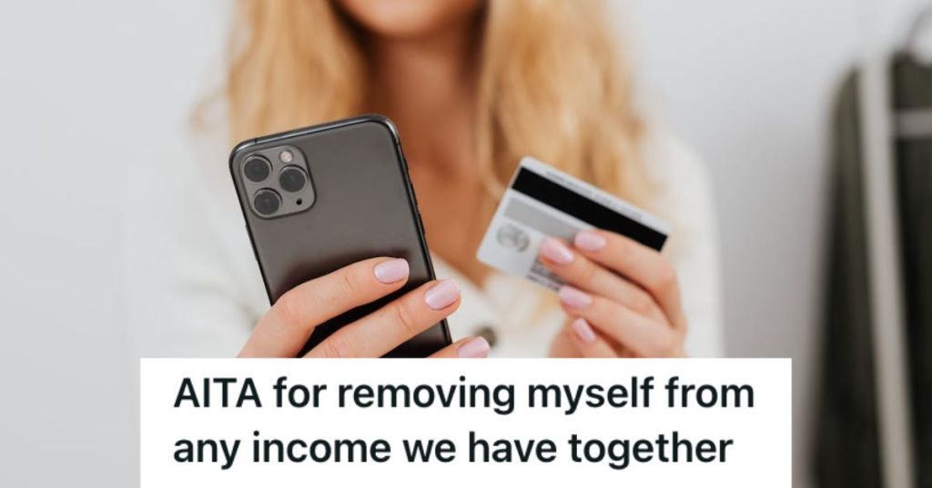 Woman holding her phone and a credit card