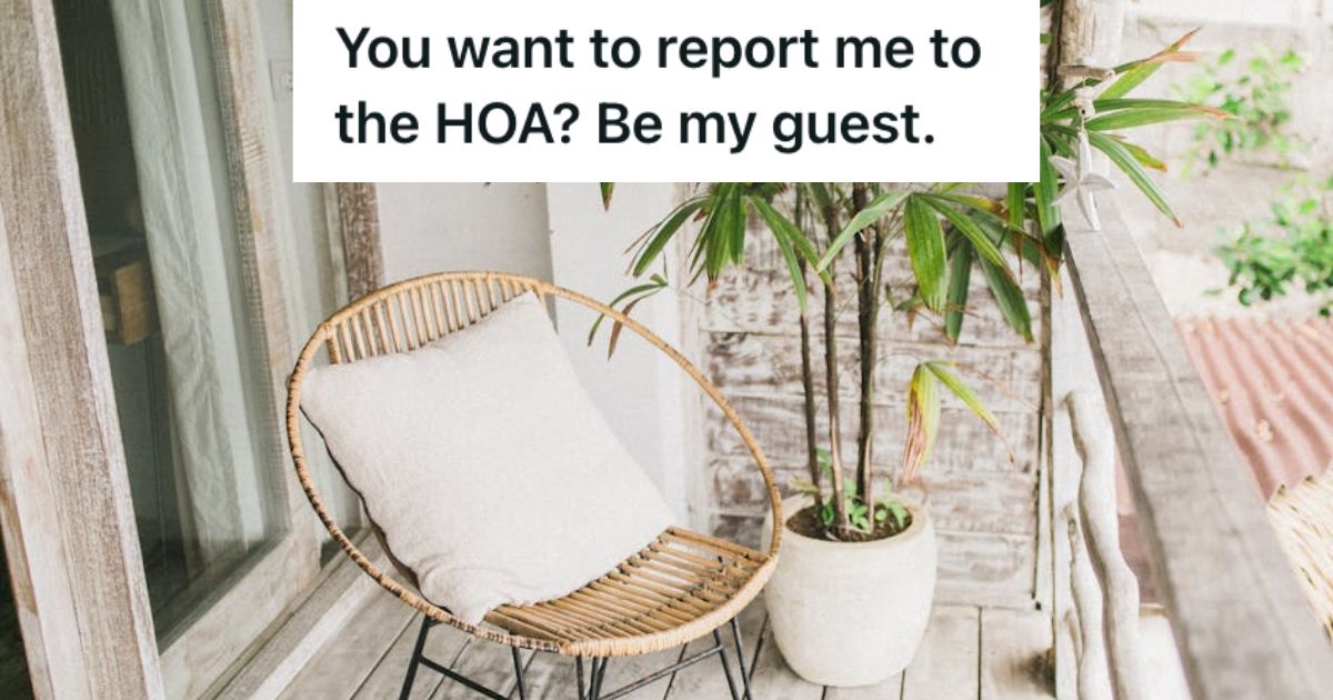 Balcony of a house with a chair and plant