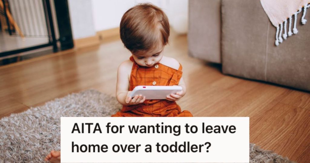 Toddler watcing a video from a phone