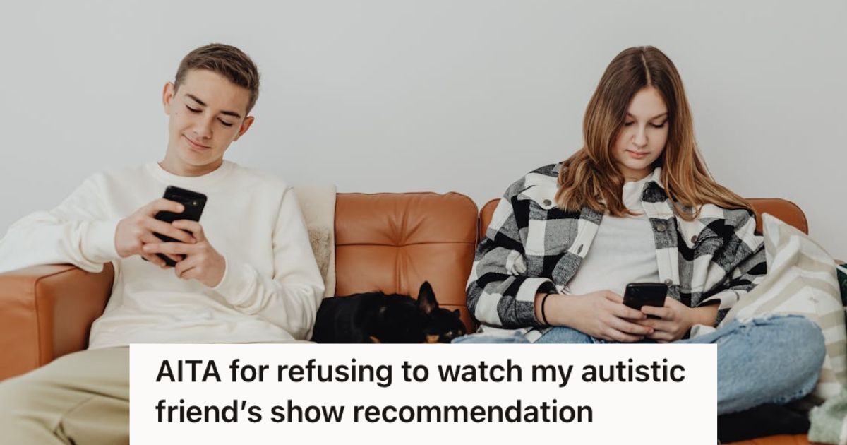 Teenage boy and girl looking at their phones