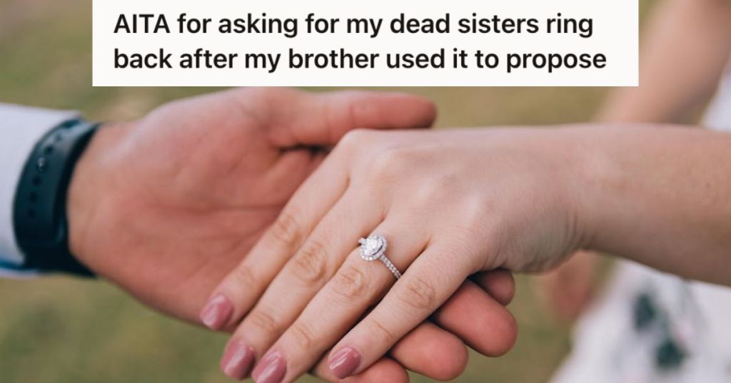 Woman's hand with an engagement ring