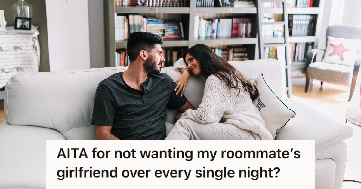 Man and woman sitting on the couch and smiling