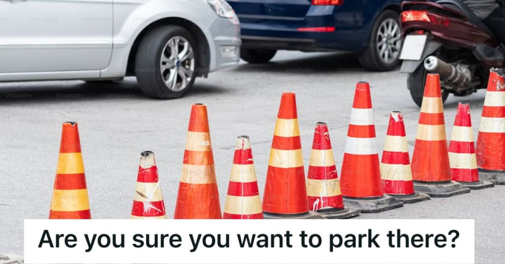 Row of orange cones blocking some cars