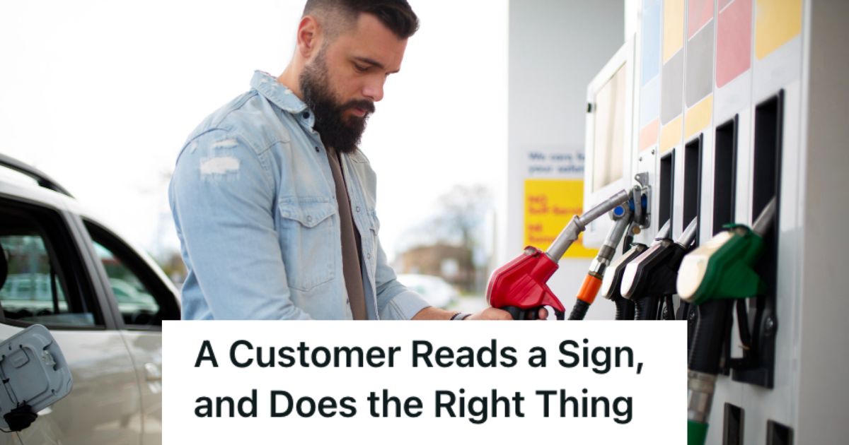 Man trying to fill up his car with fuel in a gasoline station
