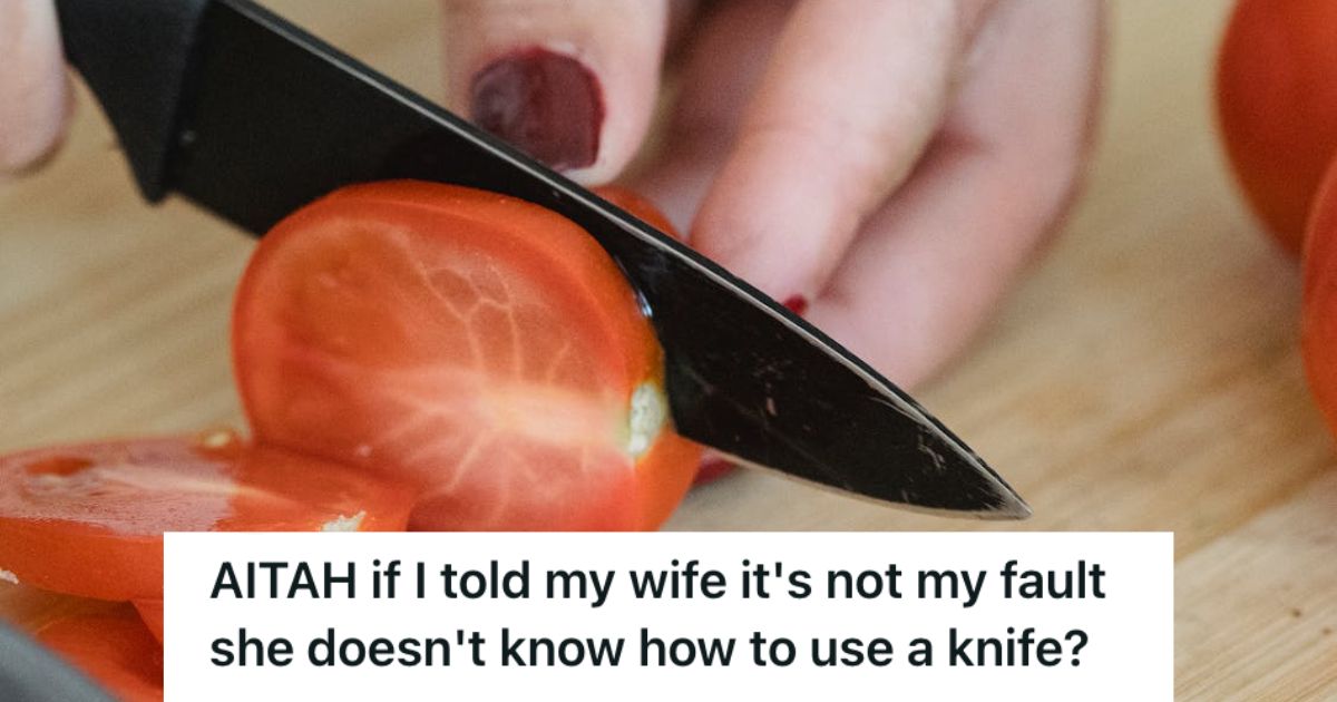 Woman cutting tomato with a knife