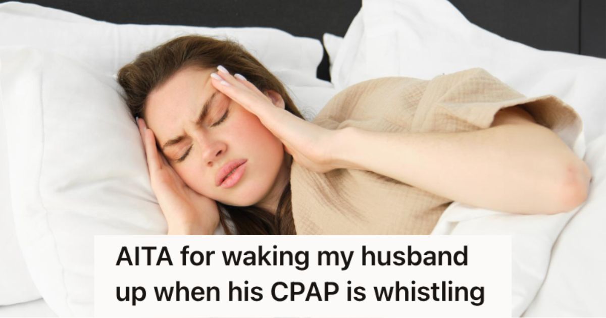 Woman touching the side of her head after waking up abruptly