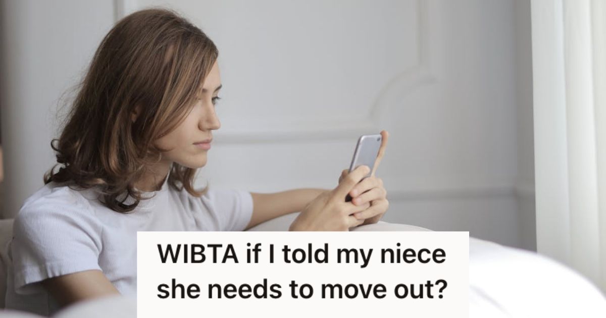 Young woman seriously browsing her phone