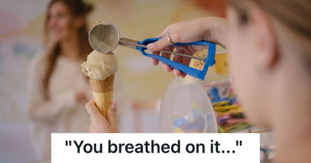 Employee scooping ice cream for a customer