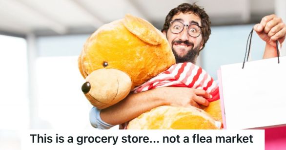 Man holding a giant teddy bear and some paper gift bags