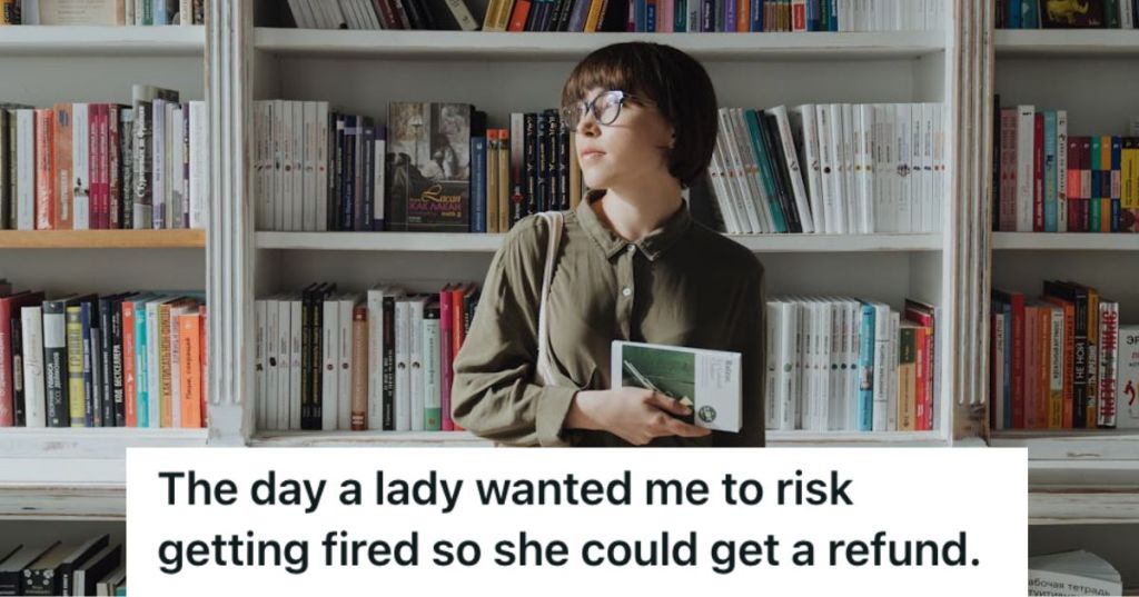 Woman holding a book at a library