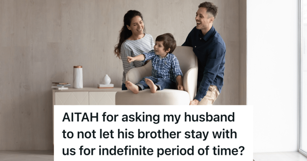parents holding child up on chair