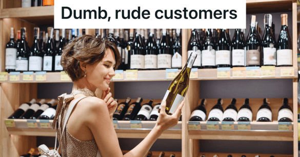 young woman holding a bottle of wine