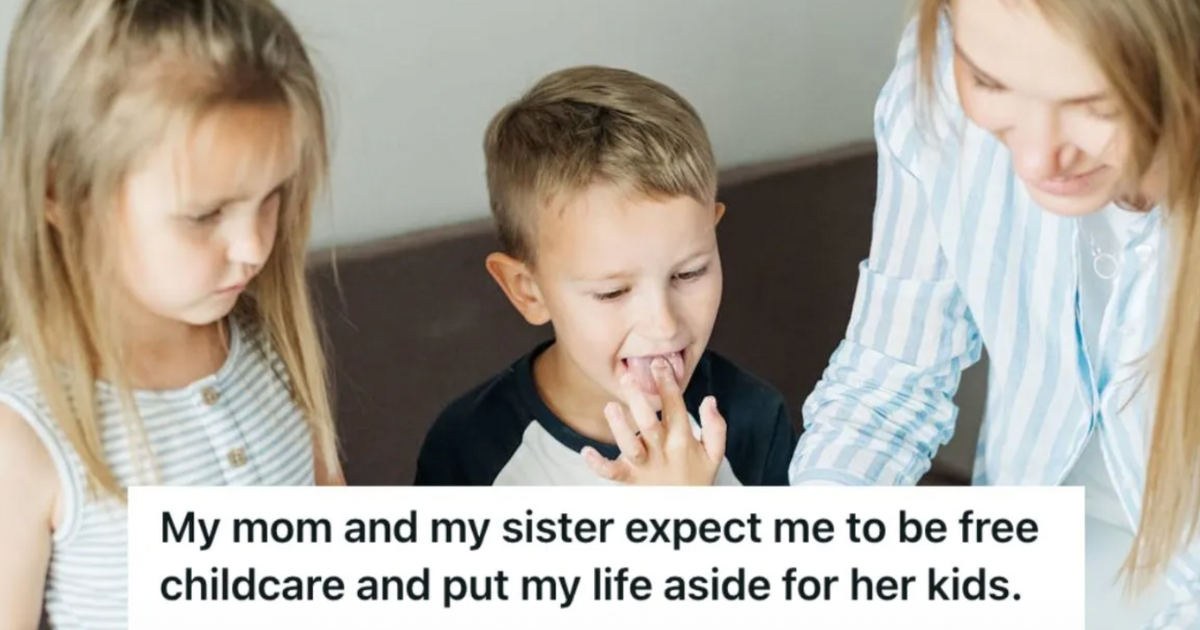 Woman playing with two young kids