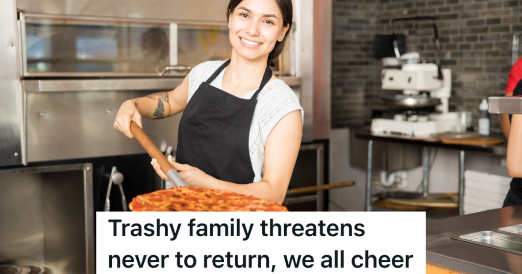 pizza restaurant employee holding pizza paddle