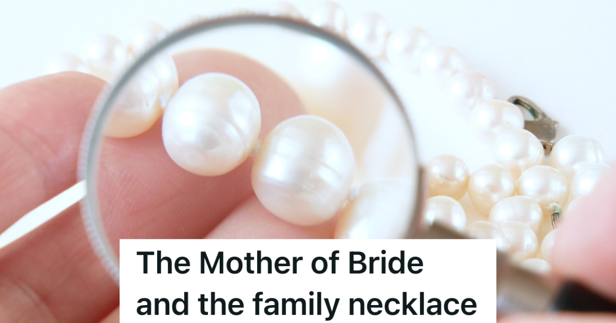 jeweler examining pearl necklace