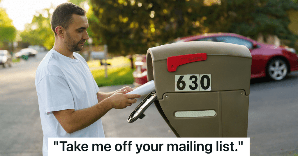 man taking mail out of his mailbox