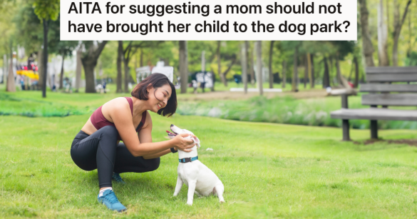 woman petting puppy at park