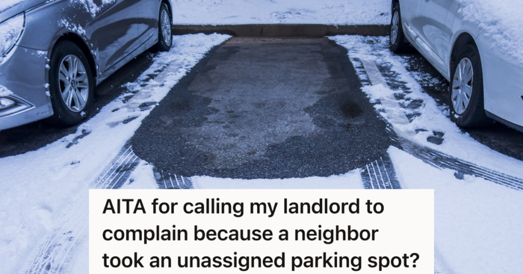 empty parking spot in snowy parking lot