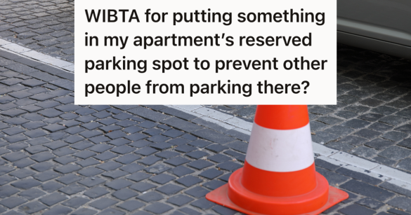 orange traffic cone in parking spot