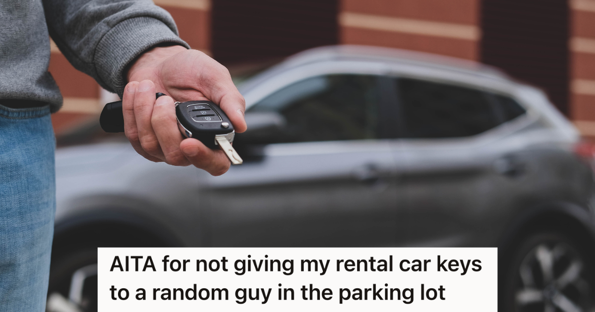 man in front of car holding car keys