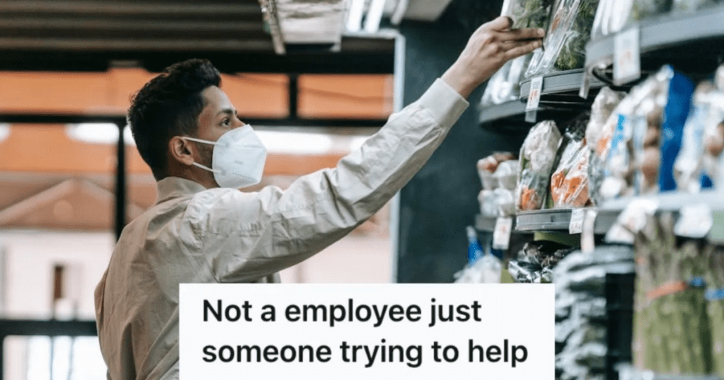 man reaching for something on a store shelf