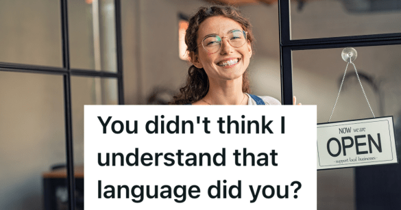 smiling woman in glasses standing next to store sign that reads "open"