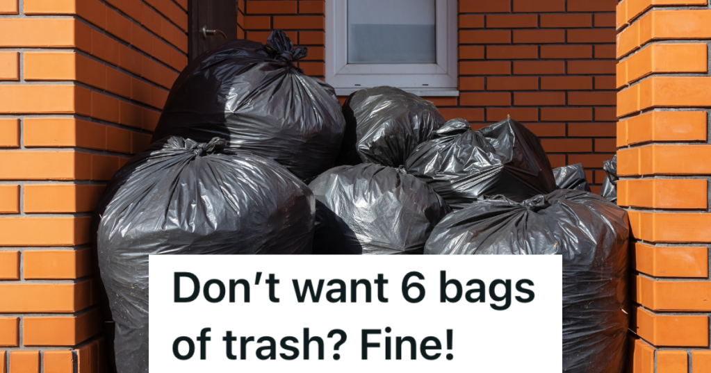 multiple large black trash bags outside brick house