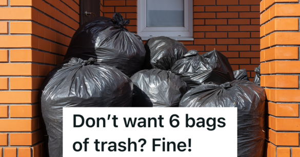 multiple large black trash bags outside brick house