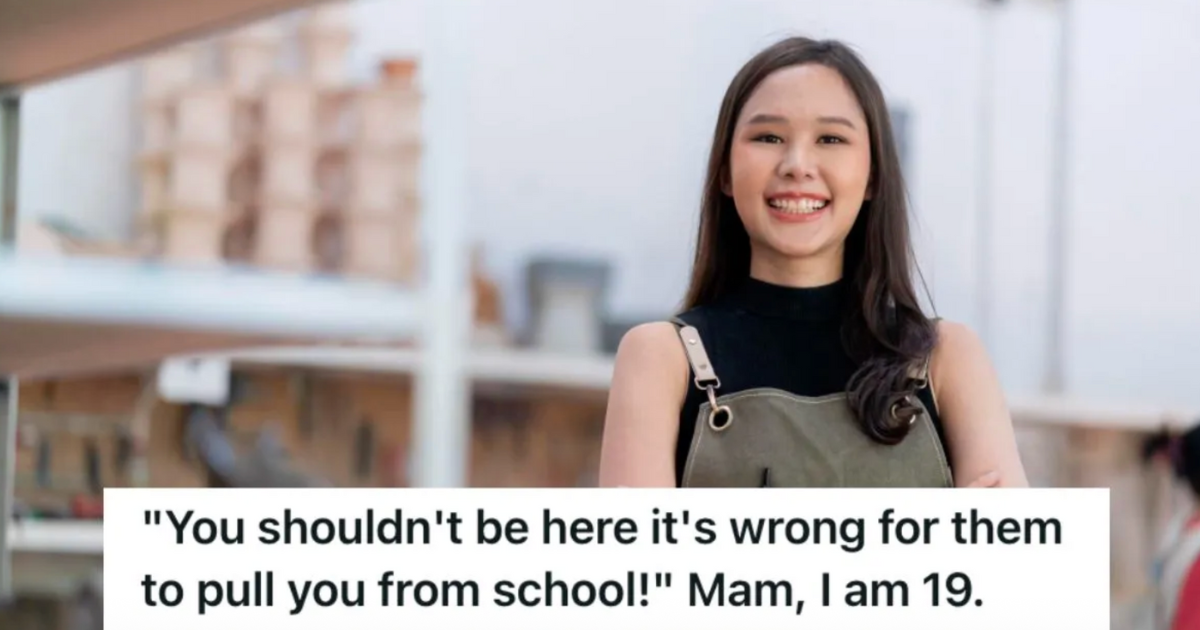 Young woman in apron smiling