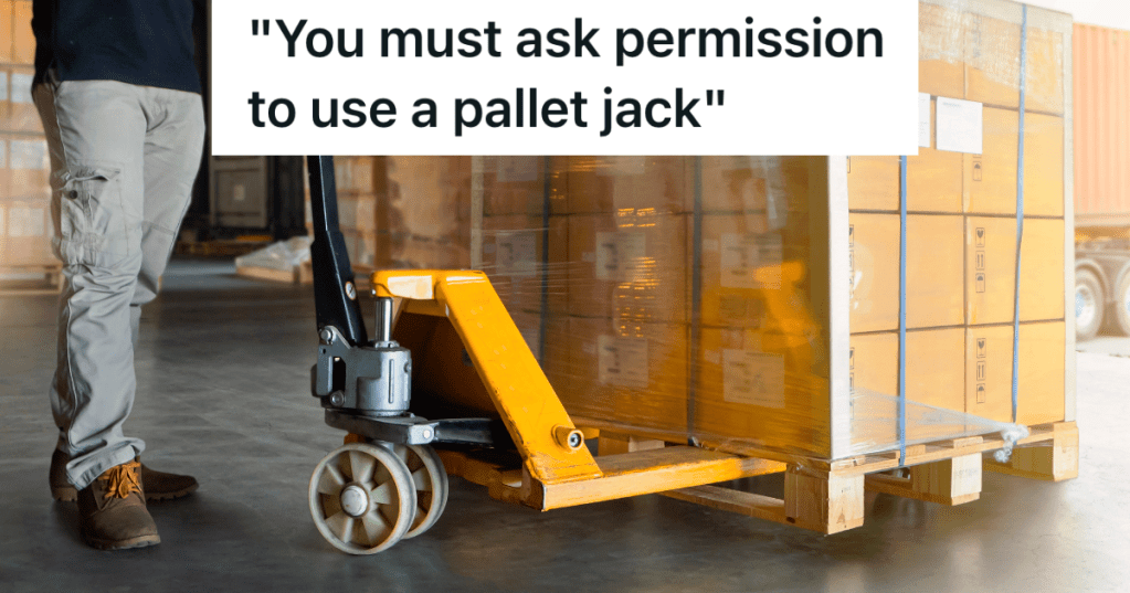 man using a pallet jack