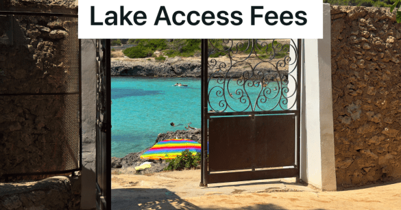 metal gate leading to a lake and beach