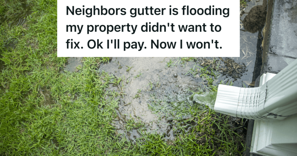 rain water pouring out of gutter and flooding yard