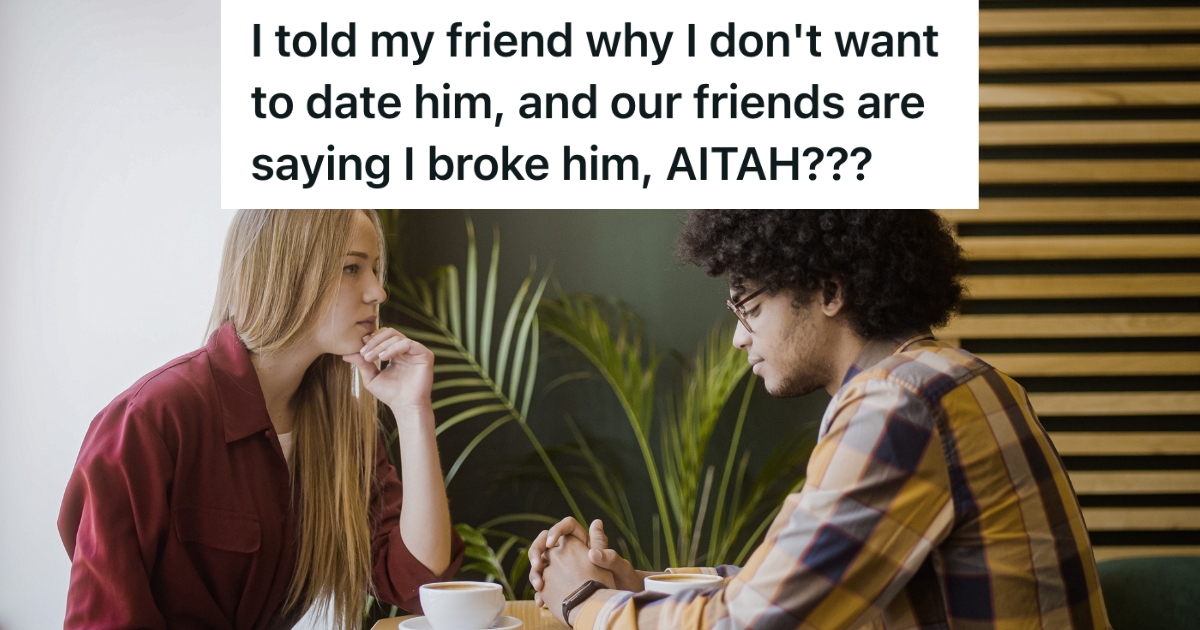 man and woman sitting at table looking serious