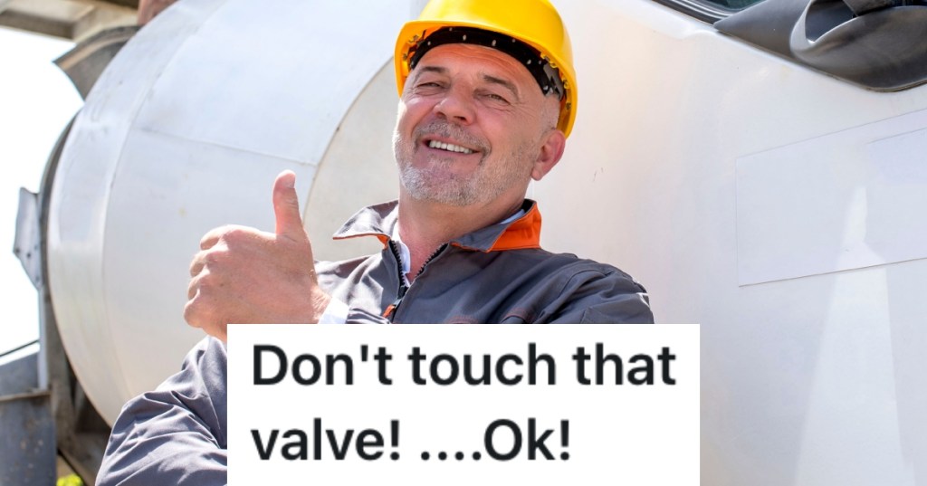 man next to a concrete truck