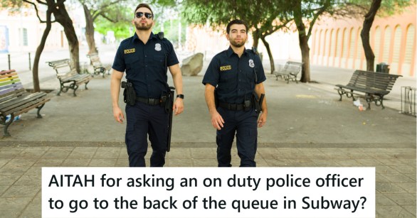 Two cops walking down a pathway