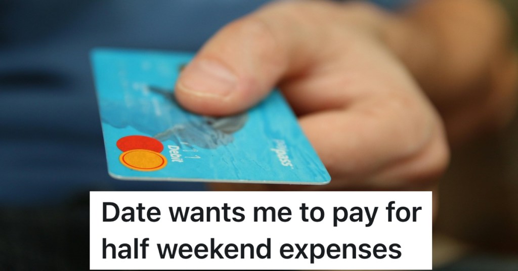 person hading over a credit card