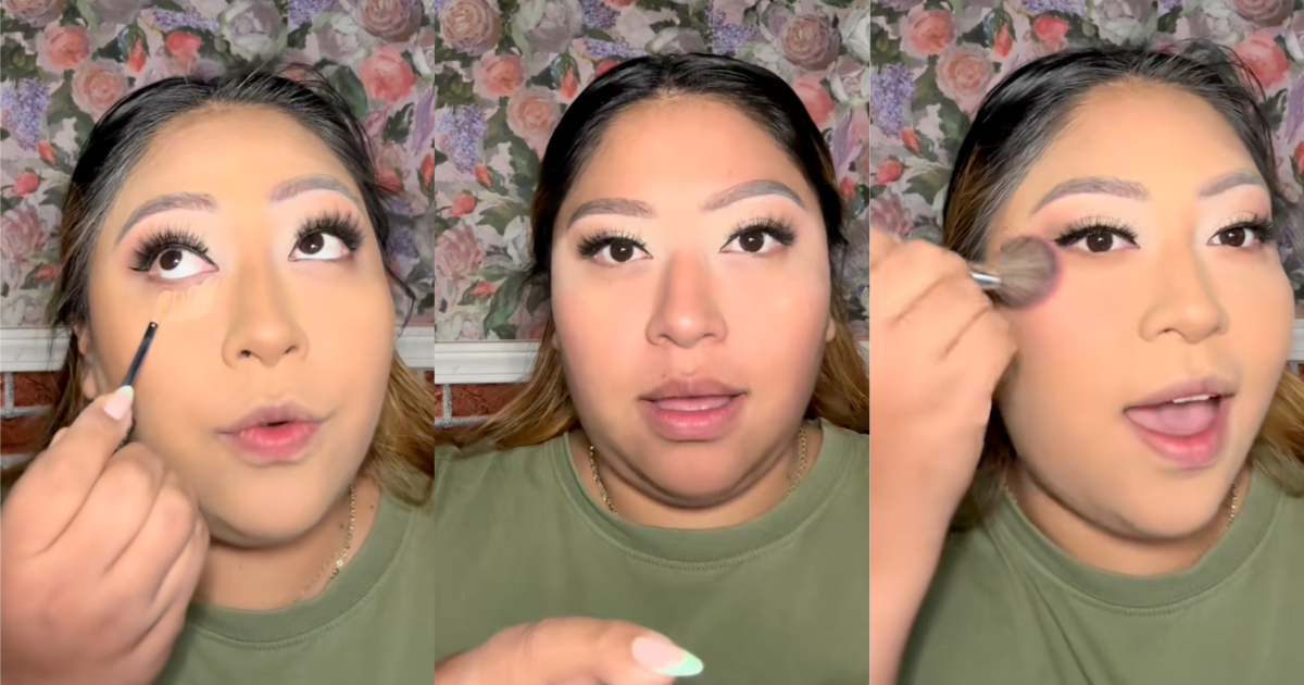 woman putting on makeup