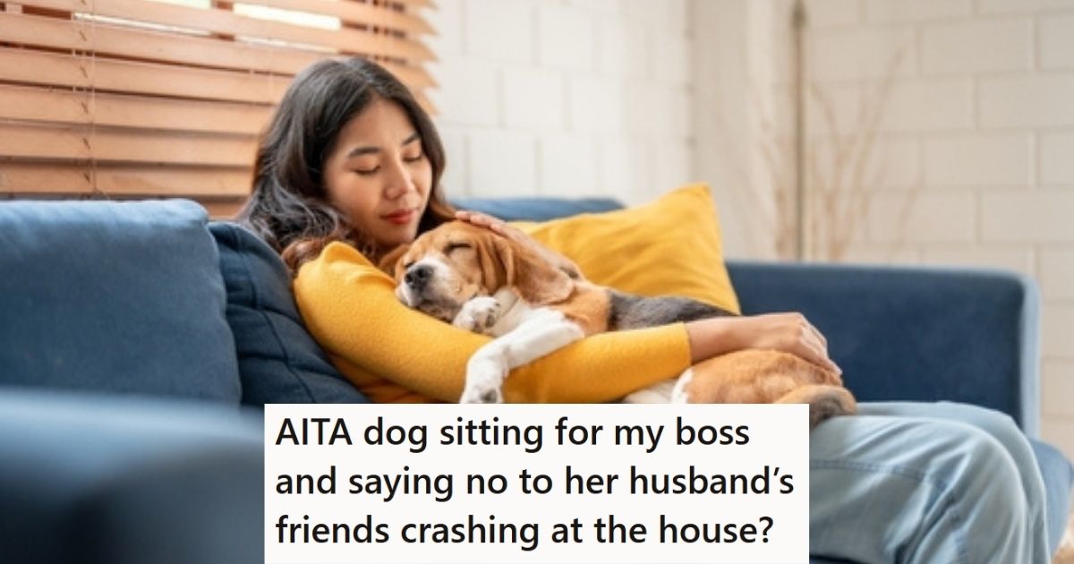 Young woman holding a dog