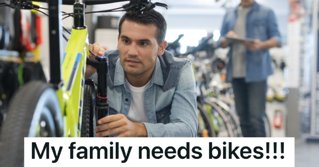 man looking at a new bike